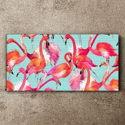 Canvas schilderij Roze flamingo's op een turquoise achtergrond