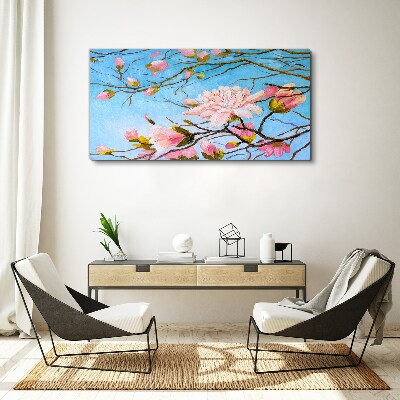 Canvas schilderij Magnoliabloemen op een blauwe achtergrond