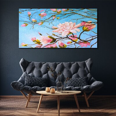 Canvas schilderij Magnoliabloemen op een blauwe achtergrond