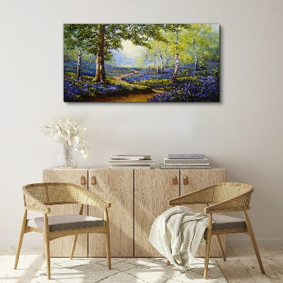 Schilderij op doek Een bloemenlaan in een boslandschap