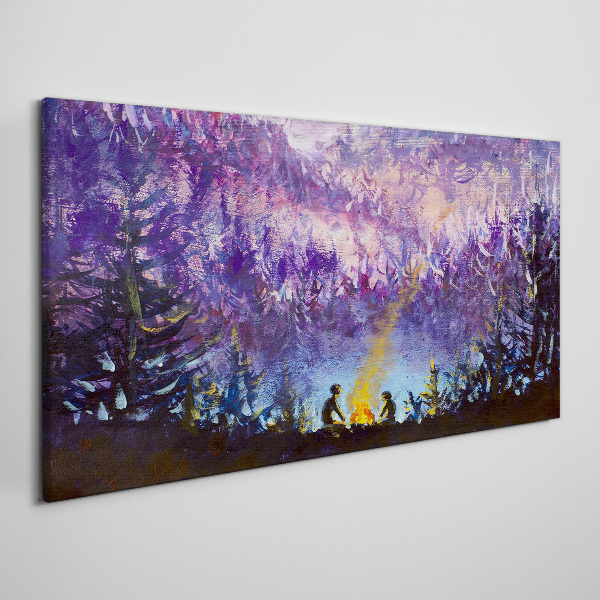 Foto op canvas De magie van een avondkampvuur in het bos