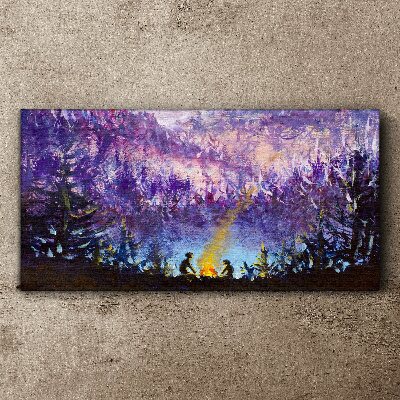 Foto op canvas De magie van een avondkampvuur in het bos