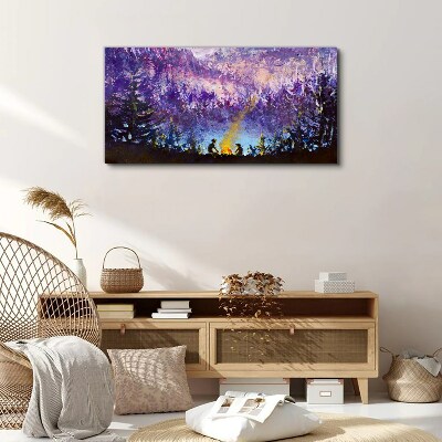 Foto op canvas De magie van een avondkampvuur in het bos