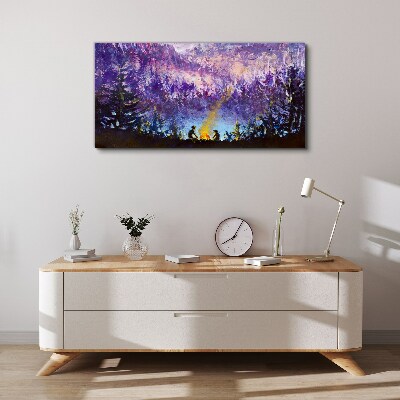 Foto op canvas De magie van een avondkampvuur in het bos