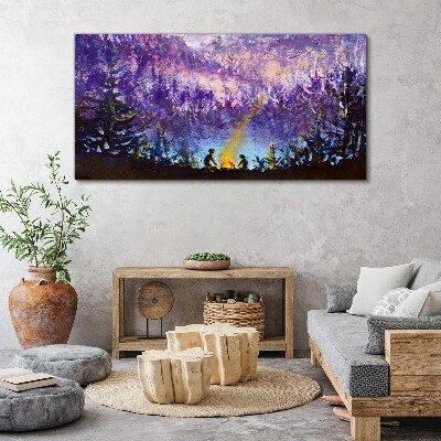 Foto op canvas De magie van een avondkampvuur in het bos