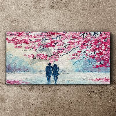 Canvas schilderij Een lentewandeling onder de bloeiende bomen