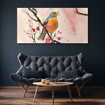 Schilderij op doek Een zingende vogel in een lentelandschap