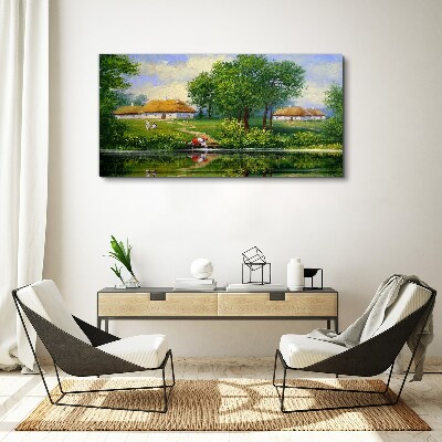 Foto op canvas Een vredig landelijk landschap aan het water