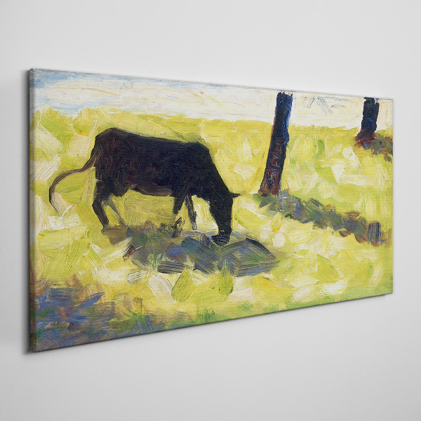 Canvas schilderij Een koe graast in een groen landschap