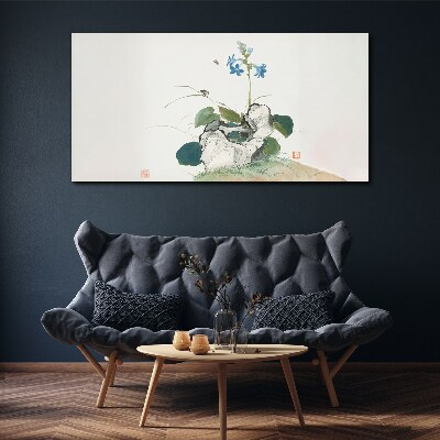 Schilderij op doek Een bloem op een stenen achtergrond