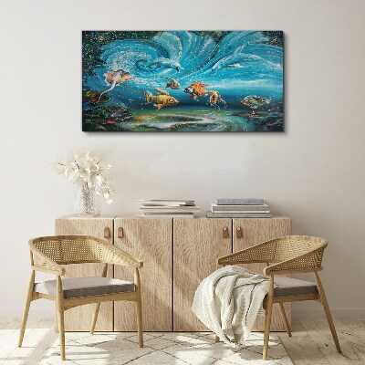 Schilderij op doek Onderwaterdans van dolfijnen en vissen