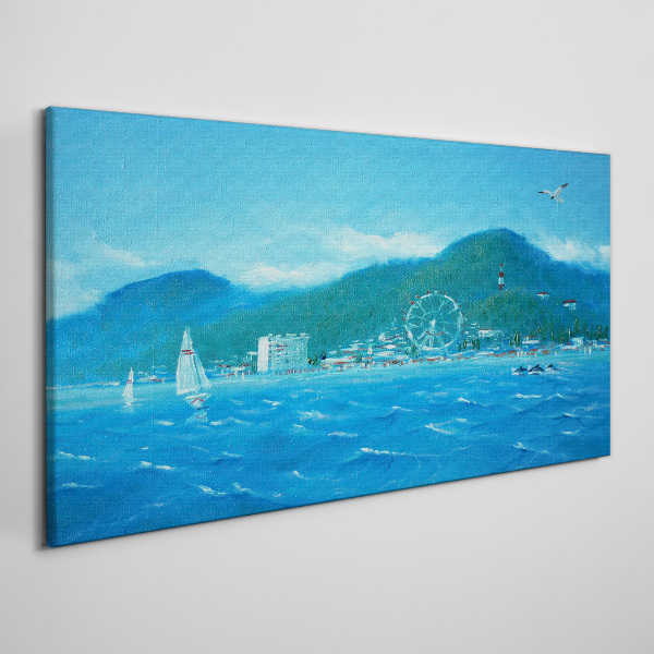 Canvas schilderij Kustlandschap met een pretpark