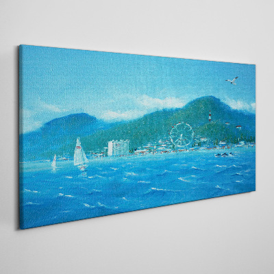 Canvas schilderij Kustlandschap met een pretpark