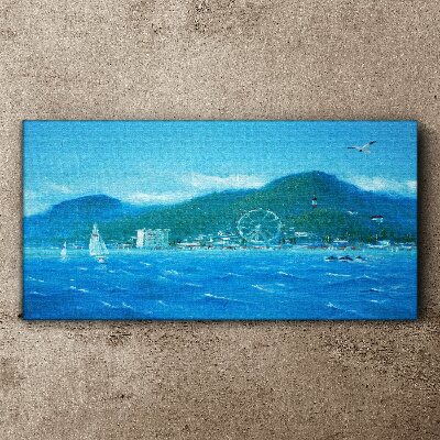 Canvas schilderij Kustlandschap met een pretpark