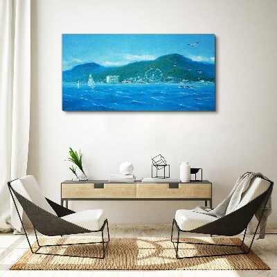 Canvas schilderij Kustlandschap met een pretpark