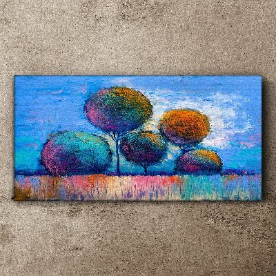 Schilderij op doek Kleurrijke bomen op een blauwe achtergrond