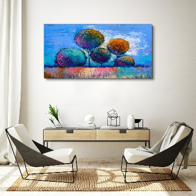 Schilderij op doek Kleurrijke bomen op een blauwe achtergrond