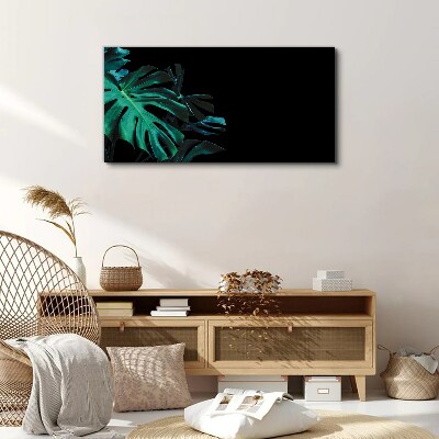 Foto op canvas Groene bladeren op een zwarte achtergrond