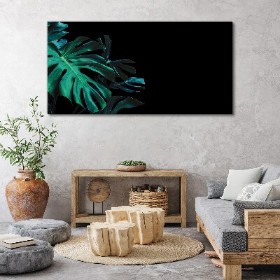 Foto op canvas Groene bladeren op een zwarte achtergrond