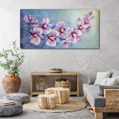 Canvas schilderij Bloemenorchideeën op een blauwe achtergrond