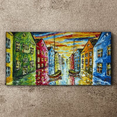 Canvas schilderij Kleurrijke huurkazernes aan de rivier