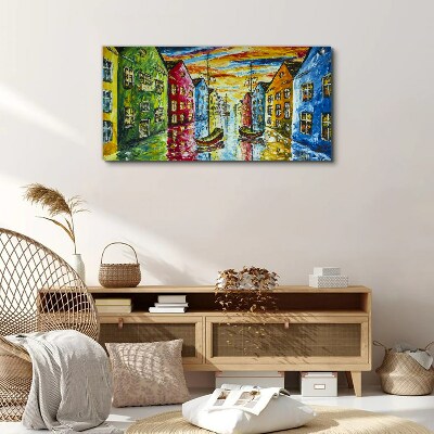 Canvas schilderij Kleurrijke huurkazernes aan de rivier