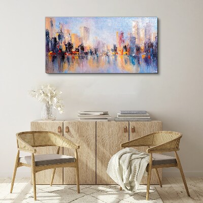 Foto op canvas De stad in de gloed van de zonsondergang