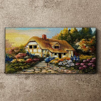 Canvas schilderij Een charmant landhuisje omgeven door bloemen