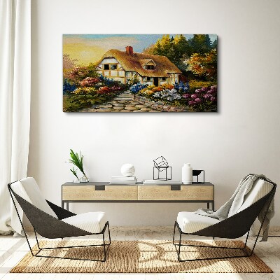 Canvas schilderij Een charmant landhuisje omgeven door bloemen
