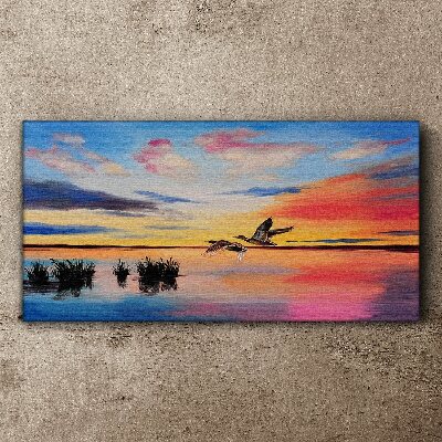 Canvas schilderij Zonsondergang over het meer