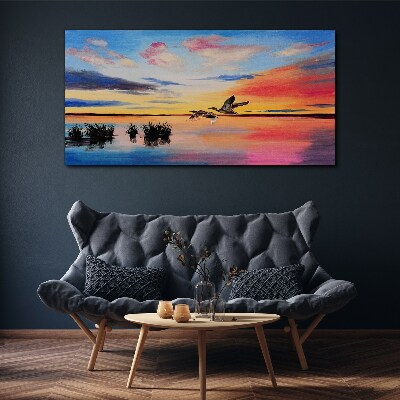 Canvas schilderij Zonsondergang over het meer