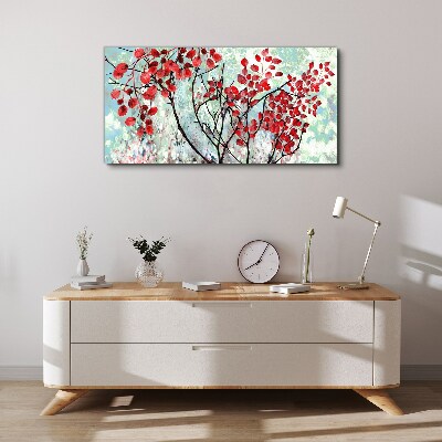 Foto op canvas Rode bladeren op een blauwe achtergrond