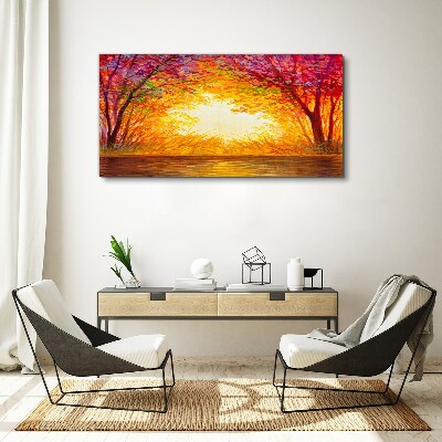 Foto op canvas Zonsondergang in een kleurrijk bos