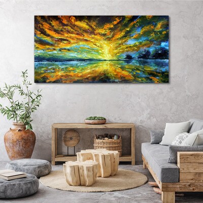 Schilderij op doek Gouden wolken boven kalm water