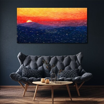 Schilderij op doek Zonsondergang boven een berglandschap