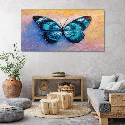 Foto op canvas Blauwe vlinder op een pastelachtergrond