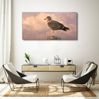 Foto op canvas Gevleugelde beschermer in de wolken