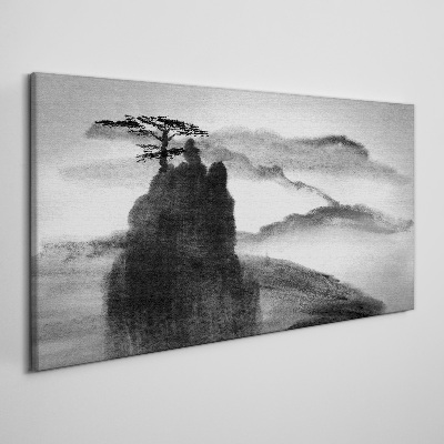 Foto op canvas Een eenzame boom op een rotsachtige berg
