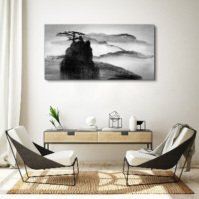 Foto op canvas Een eenzame boom op een rotsachtige berg