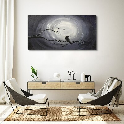 Canvas schilderij Een eenzame vogel op een tak