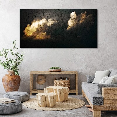 Schilderij op doek Gouden wolken op een donkere achtergrond