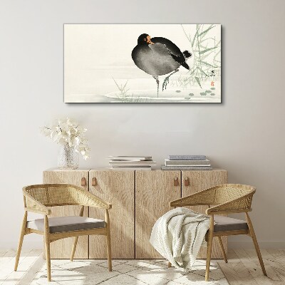 Foto op canvas Een vogel op het gras
