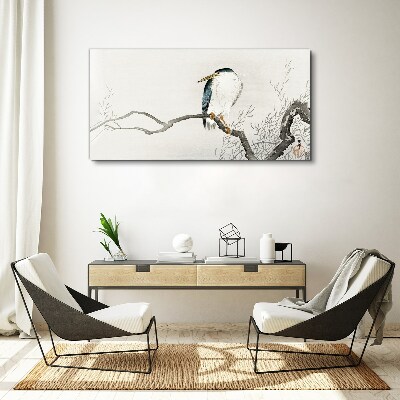 Schilderij op doek Een vogel op een tak in een delicaat landschap