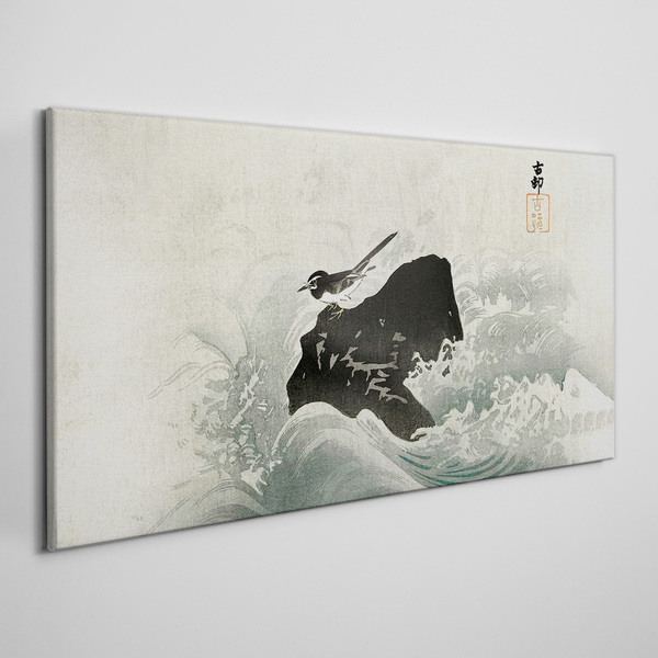 Canvas schilderij Een vogel op een rots in de golven