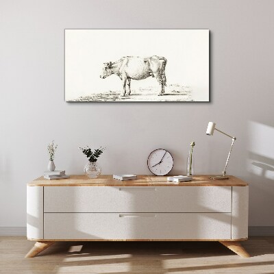 Canvas schilderij Een kalme koe tegen de achtergrond van de natuur