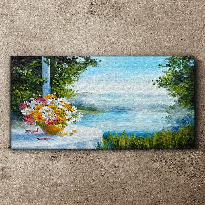 Foto op canvas Een boeket bloemen aan het meer