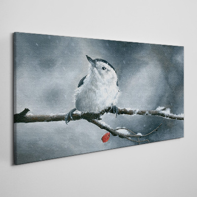 Schilderij op doek Wintervogel op een tak
