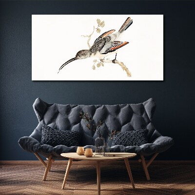 Foto op canvas Een vogel op een tak