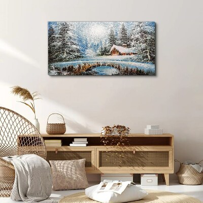 Foto op canvas Winterlandschap met een huisje in het bos