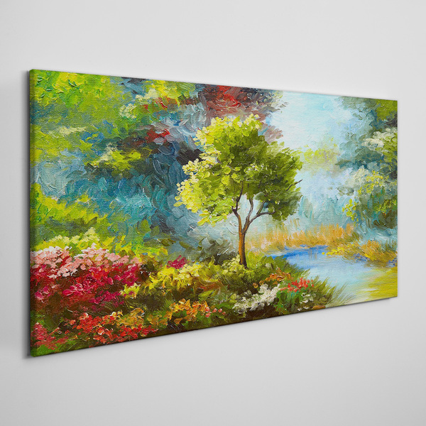 Schilderij op doek Lentelandschap met een boom en bloemen